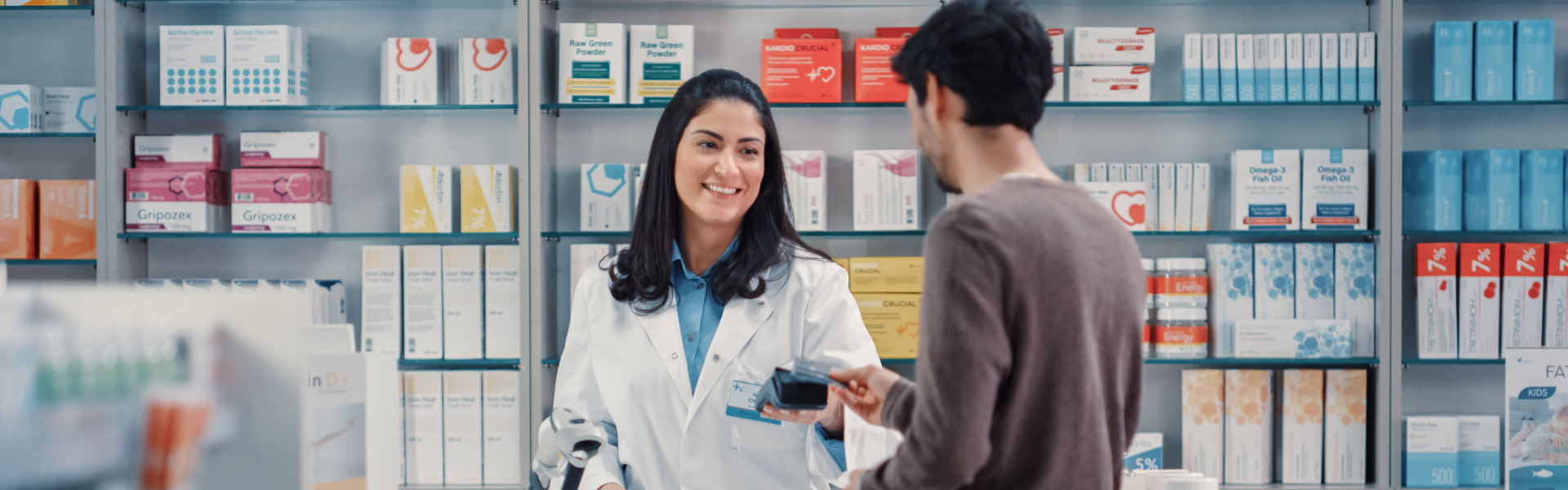 pharmacist assist her customer