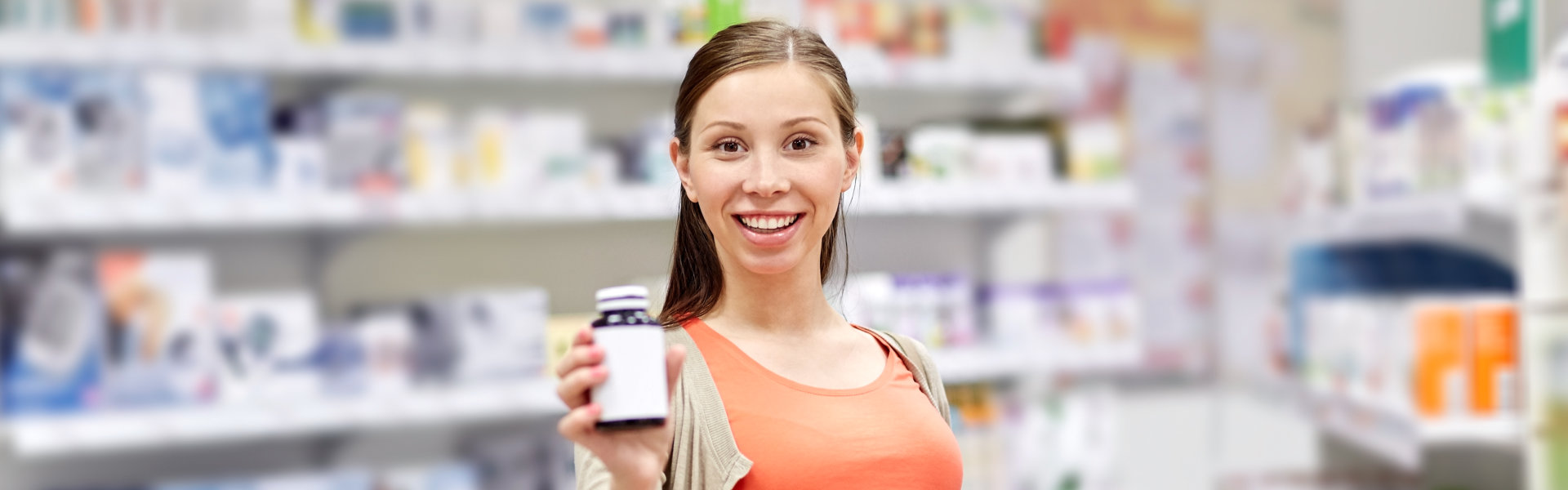woman hold a bottle of medicine