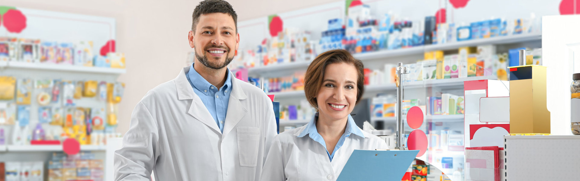 two pharmacist smiling